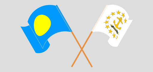 Crossed and waving flags of Palau and the State of Rhode Island