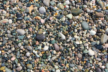 wet pebble stones on the beach
