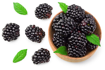 blackberries with leaves in wooden bowl isolated on white background. clipping path. top view