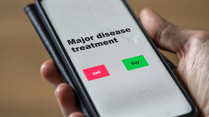 An investor's analyzing the major disease treatment etf fund on screen. A phone shows the ETF's prices stocks to invest