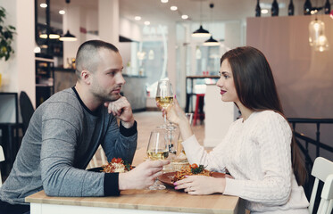 Young couple sitting in a restaurant for a romantic dinner