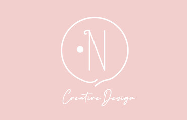 pink white N alphabet letter logo icon design with circle and vintage style. Creative template for company and business
