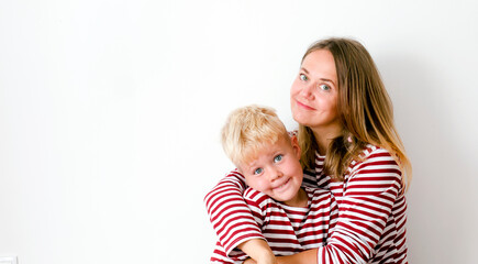 Portrait of happy mother and son over white background , Mother’s Day background