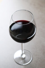 Top view photo of one glass of red wine 
