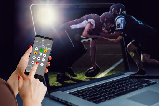 a mobile phone shows a betting application with live results and updates with white background. Online betting concept. - Powered by Adobe