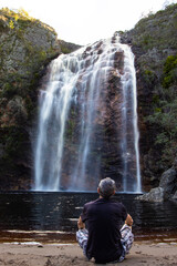 person in the waterfall