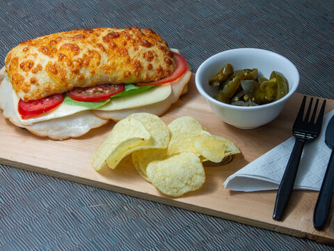 chapata sandwich with ham and cheese