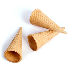 Top view of three empty crunchy cones of ice cream on a white background