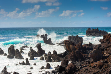 Powerful waves against the sea stacks of Lanzarote island, Atlantic Ocean, Canary Islands in Spain
