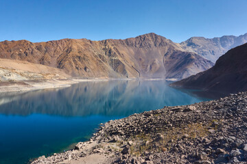 lake and mountains in cajon del maipo in chile