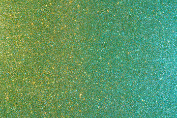 Background with sparkles. Backdrop with glitter. Shiny textured surface. Dark moderate cyan lime...