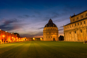 Pisa, Italy, 14 April 2022: Beautiful sunset over Campo dei Miracoli  square