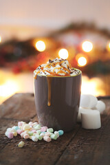 Side view of delicious coffee with caramel in a cup