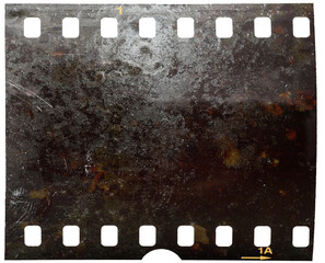 Old fashioned 35mm filmstrip or dia slide frame with burned surface..