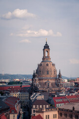 Fototapeta na wymiar Aerial view of roof tops and the dome of Frauenkirche in Dresden during summer sunset