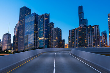 Plakat Empty urban asphalt road exterior with city buildings background. New modern highway concrete construction. Concept of way to success. Transportation logistic industry fast delivery. Chicago. USA.