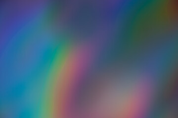 Blur neon glow. Holographic background. Bokeh radiance. Defocused purple pink blue orange color gradient light rays on creative abstract copy space texture.