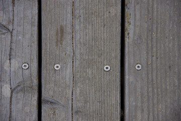 Close-up top view of weathered heavy wooden floor planks