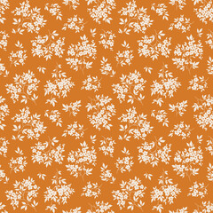 Cute floral pattern in the small flower. Seamless vector texture. Elegant template for fashion prints. Printing with small white flowers. Yellow mustard background. Stock print.