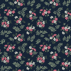 Trendy seamless vector floral pattern. Endless print made of small white ad pink flowers. Summer and spring motifs. Dark blue background. Stock vector illustration.