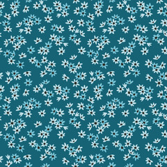 Vector seamless pattern. Pretty pattern in small flowers. Small blue flowers. Cute background. Ditsy floral background. The vintage template for fashion prints. Stock vector.