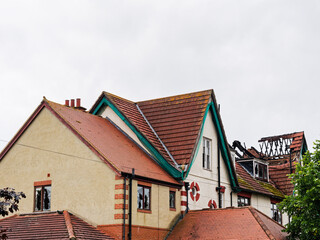derelict building withdamaged roof.