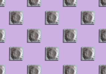 Condoms in a package on a purple background. Seamless pattern of contraceptives. The concept of safe sex and reproductive health.