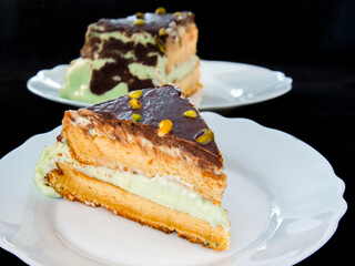 Cream cake made from pistachio on a plate