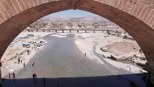 Aerial view of Severan Bridge and Chabinas creek at Adiyaman province, southeastern Anatolia, Turkey. Cendere bridge or Chabinas bridge is a late Roman bridge located near the ancient city of Arsameia