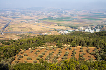 View of the Jezreel Valley in fog in winter cloudy day from Muhraqa on Mount Carmel in Lower Galilee, Israel