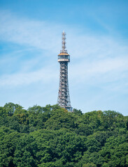 Fototapeta premium Prague, Czech Republic - June 2022: View with Petrin Tower, a major tourist attraction in Prague