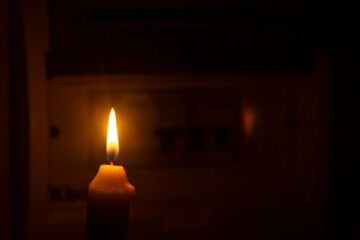 candle and electrical switches, electricity cut-off, blackout