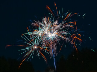 Colorful fireworks at Haus im Wald, Bavarian forest, Bavaria, Germany