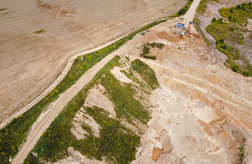 Aerial view of the mining quarry. Industrial landscape sand and desert.