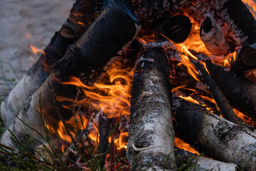 Close-up of traditional bonfire at the seaside in summer day.