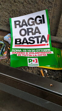 Rome, Italy - October 20, 2019: Protest Flyer Of The Democratic Party Against The Mayor Of Rome Virginia Raggi, Abandoned In A Trash Can