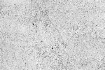 Heavily textured white and gray stucco, adobe or concrete wall for ad copy space, composite...