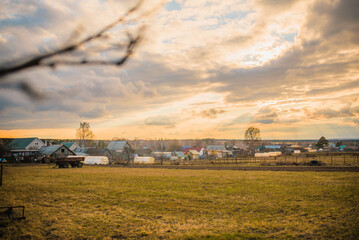 Obraz premium russian village landscape at sunset