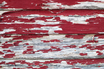 Rustic closeup of red wood barn wall
