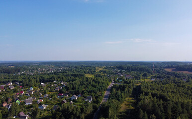 Fototapeta na wymiar Aerial view of the green summer forest with trees