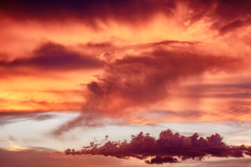 Bright orange clouds in the Arizona sky at sunset