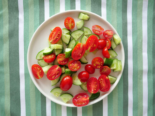 Summer salad of cucumbers and tomatoes.
