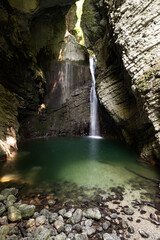 Fototapeta na wymiar Kozjak waterfall in slovenia falling into a lake