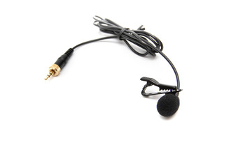 Lavalier microphone, isolated on white background. Selective focus. A lavalier microphone (also called a lavalier microphone, clip-on microphone, or personal microphone).