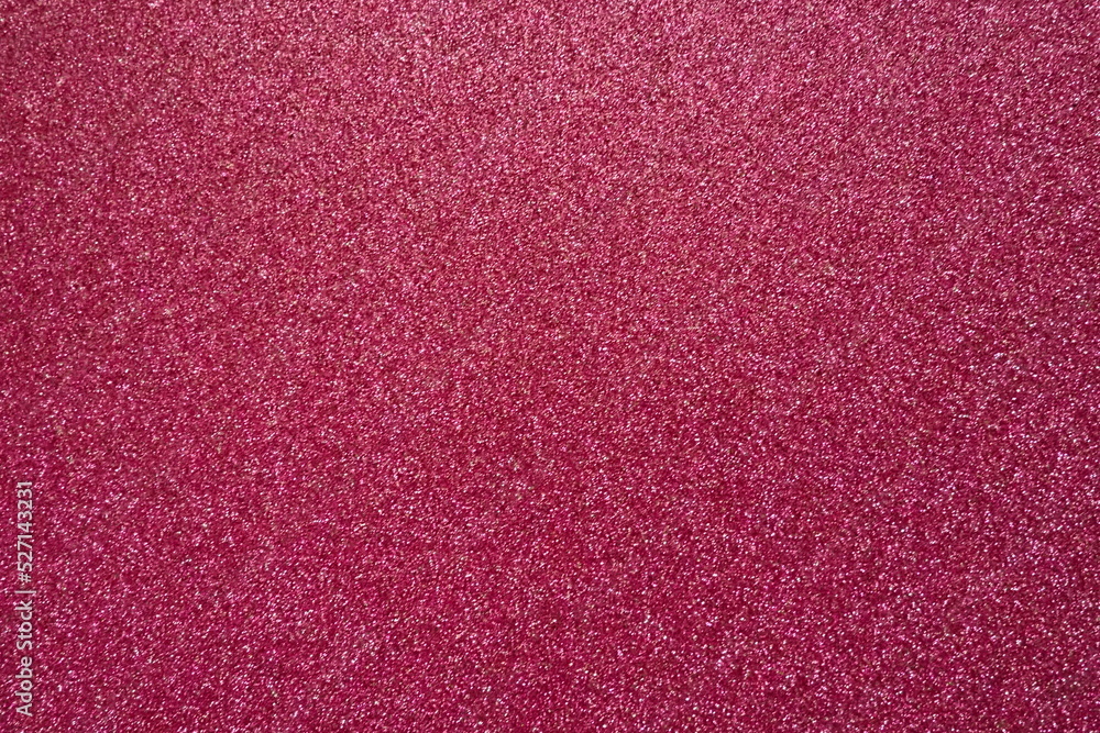 Poster cold red. texture of rough paper or cardboard. defocused bokeh sparkles and shine. festive red backg