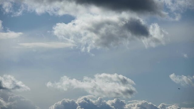 Time lapse of blue sky and drifting dark clouds. Natural background. Clean atmosphere. Climate change