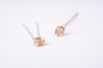 Electronic parts photoresistor on the white background.