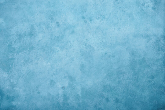 light blue background with vintage mottled texture
