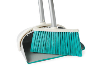 Plastic broom and dustpan on white background
