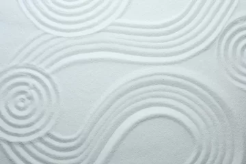 Foto auf Leinwand Weißer Sand mit Muster als Hintergrund, Draufsicht. Zen, Meditation, Harmonie © New Africa